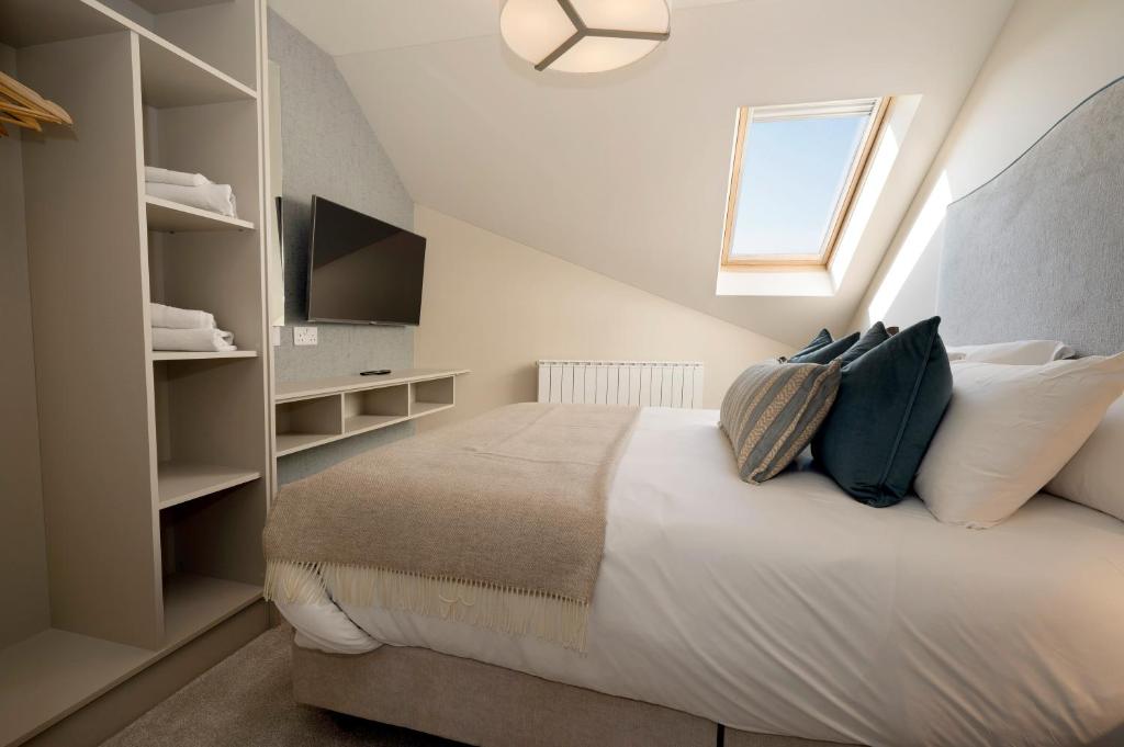 Postel nebo postele na pokoji v ubytování Donegal Boardwalk Resort