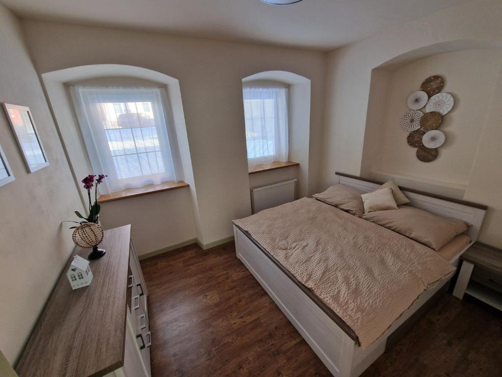 Postel nebo postele na pokoji v ubytování U Šimonů