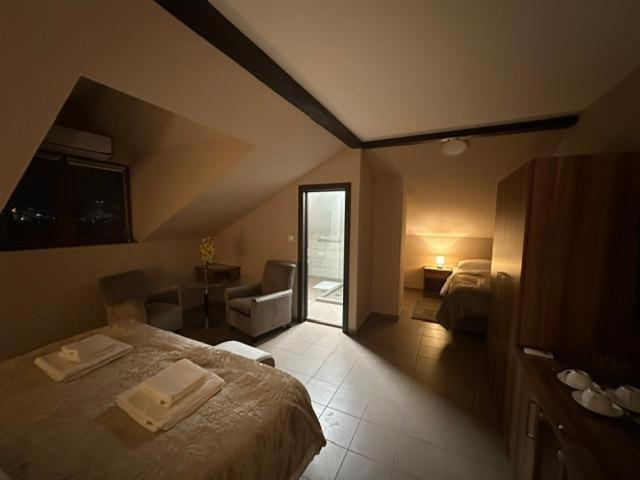 Postel nebo postele na pokoji v ubytování JP Motel Mali Pariz