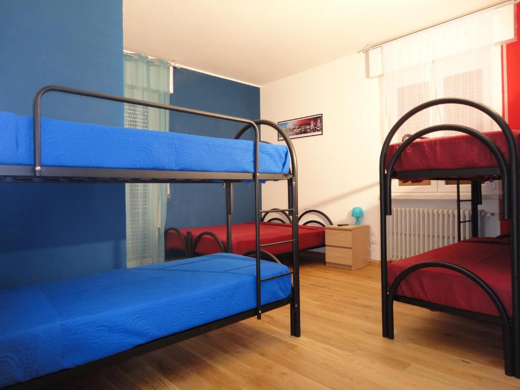 Postel nebo postele na pokoji v ubytování Pavia Ostello