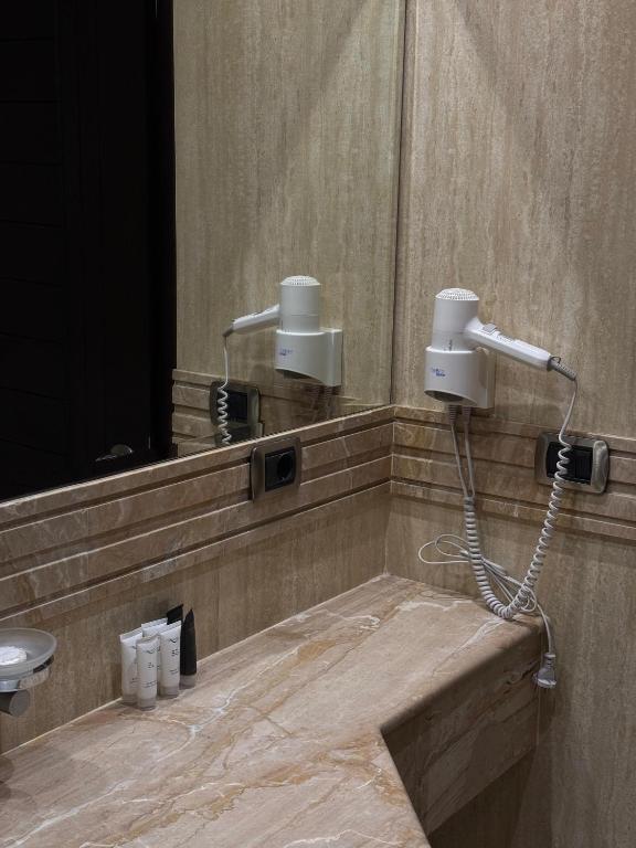Koupelna v ubytování Ny Suites