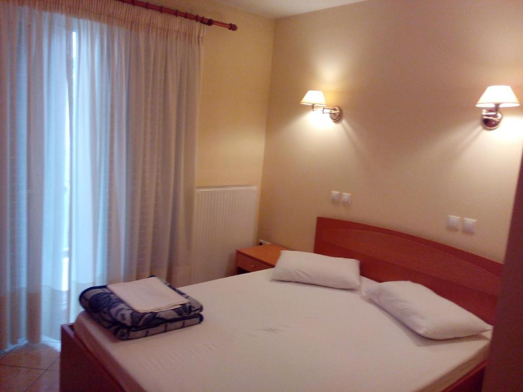 Ένα ή περισσότερα κρεβάτια σε δωμάτιο στο Cybele Guest Accommodation
