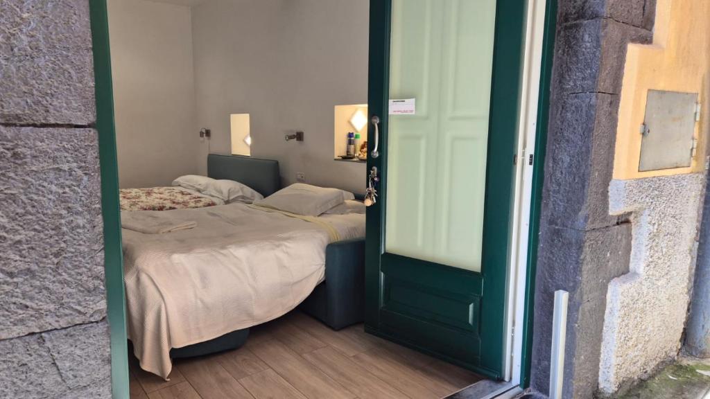 Łóżko lub łóżka w pokoju w obiekcie Casa Isabella De Luxe Studio