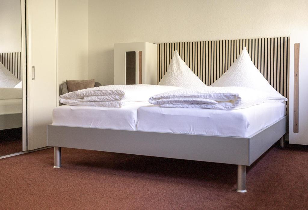 Postel nebo postele na pokoji v ubytování Pension Haus Monika