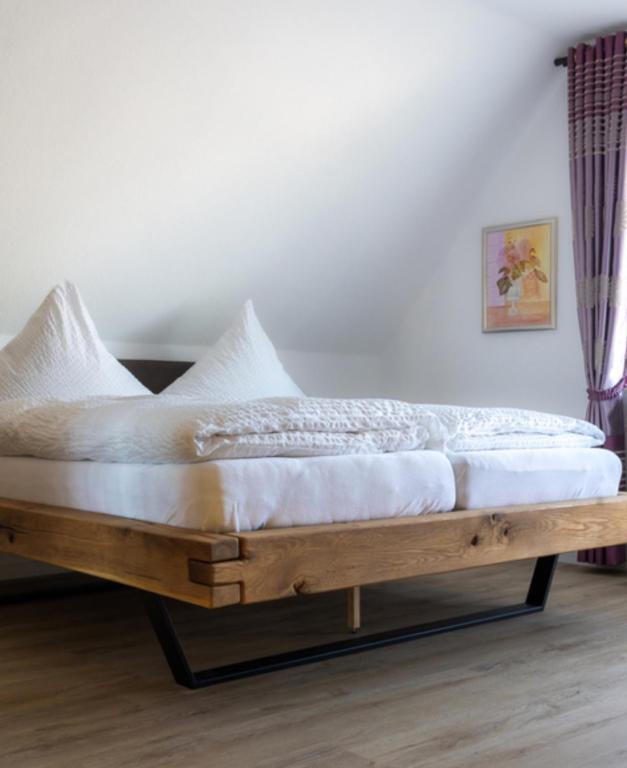 Postel nebo postele na pokoji v ubytování Pension Haus Monika