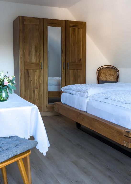 Postel nebo postele na pokoji v ubytování Pension Haus Monika