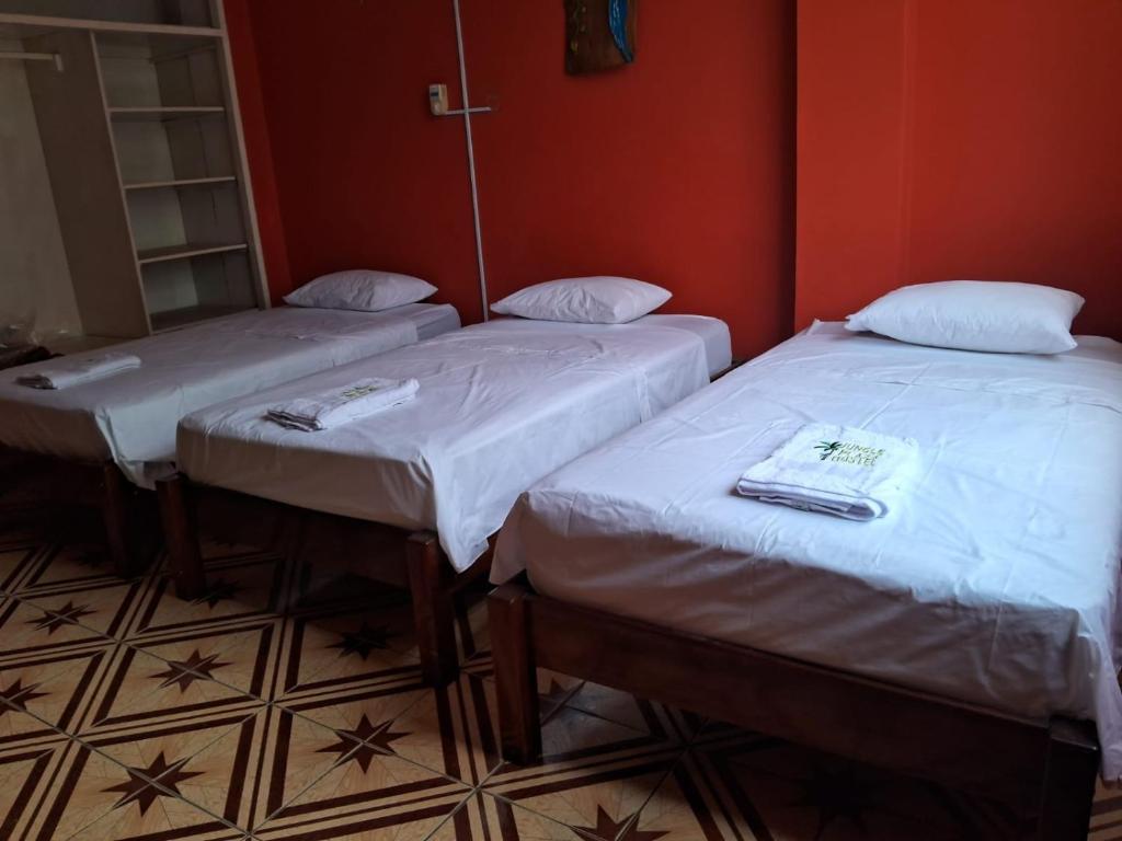 Postel nebo postele na pokoji v ubytování Plaza Jungle Hostel