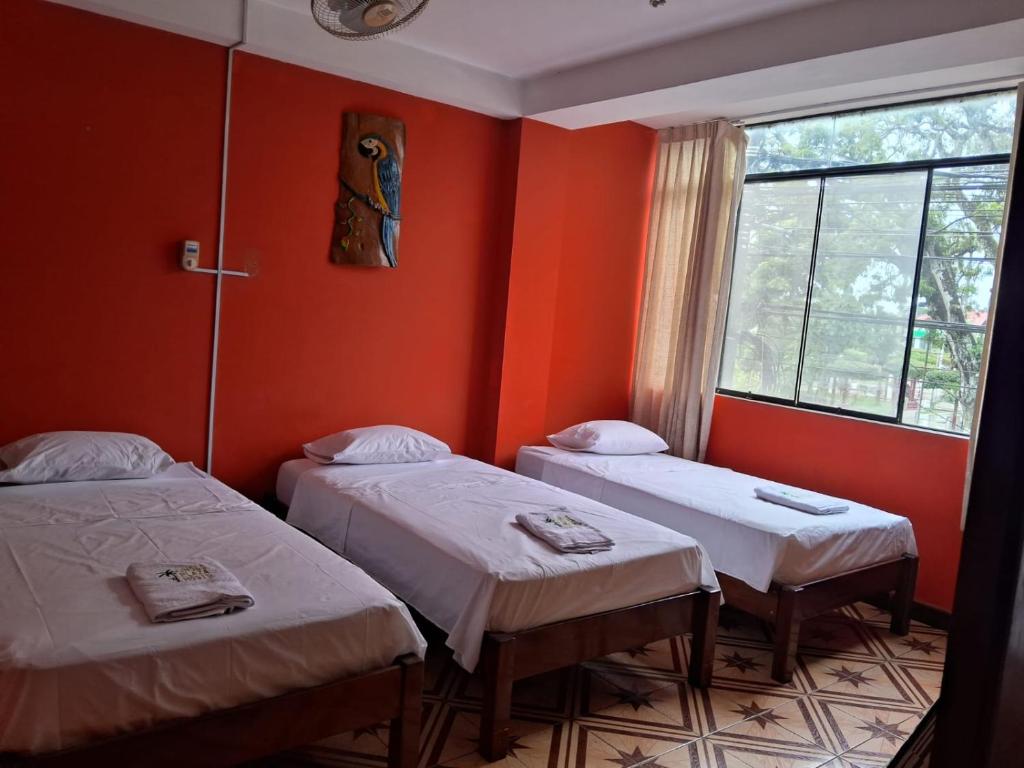 Postel nebo postele na pokoji v ubytování Plaza Jungle Hostel