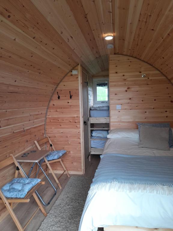 Postel nebo postele na pokoji v ubytování Siabod Huts