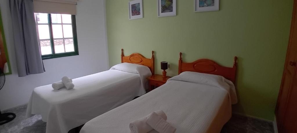 Postel nebo postele na pokoji v ubytování Serene Apartments Las Casitas Las Puntas El Hierro