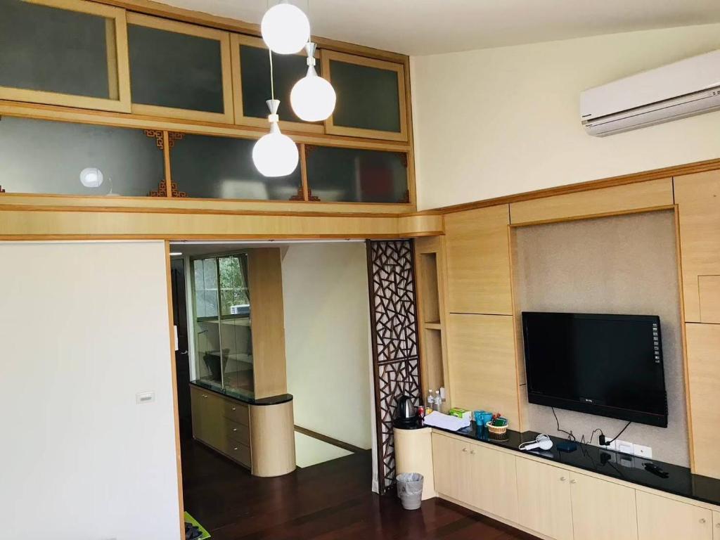 Kuchyň nebo kuchyňský kout v ubytování Miaoli Sanyi Travelling Homestay