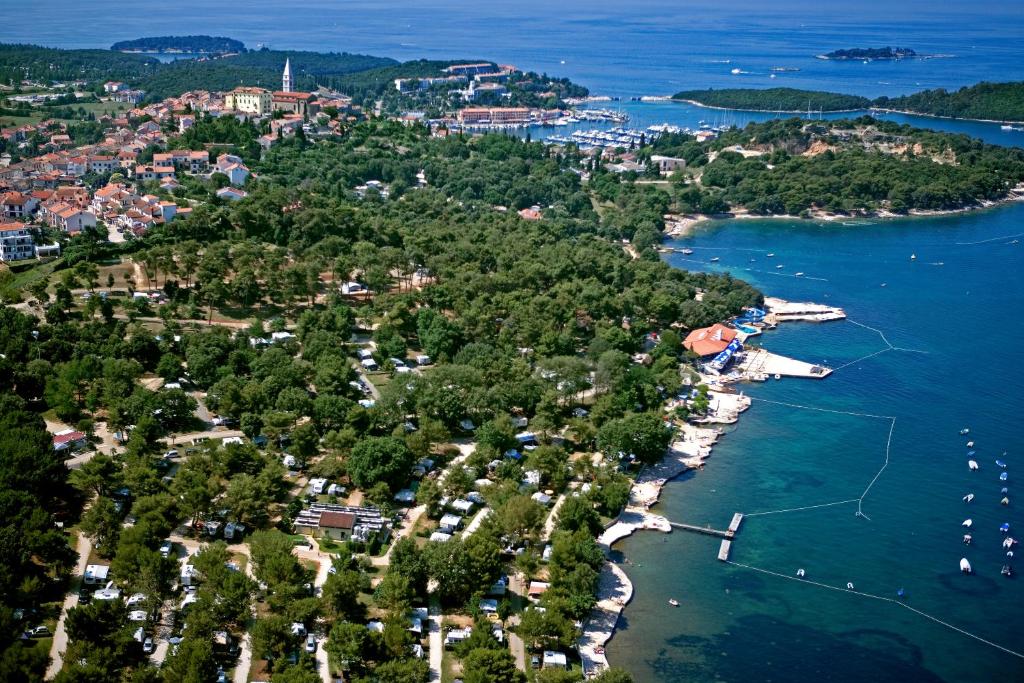 an aerial view of a small island in the water at Orsera Camping Resort by Valamar in Vrsar
