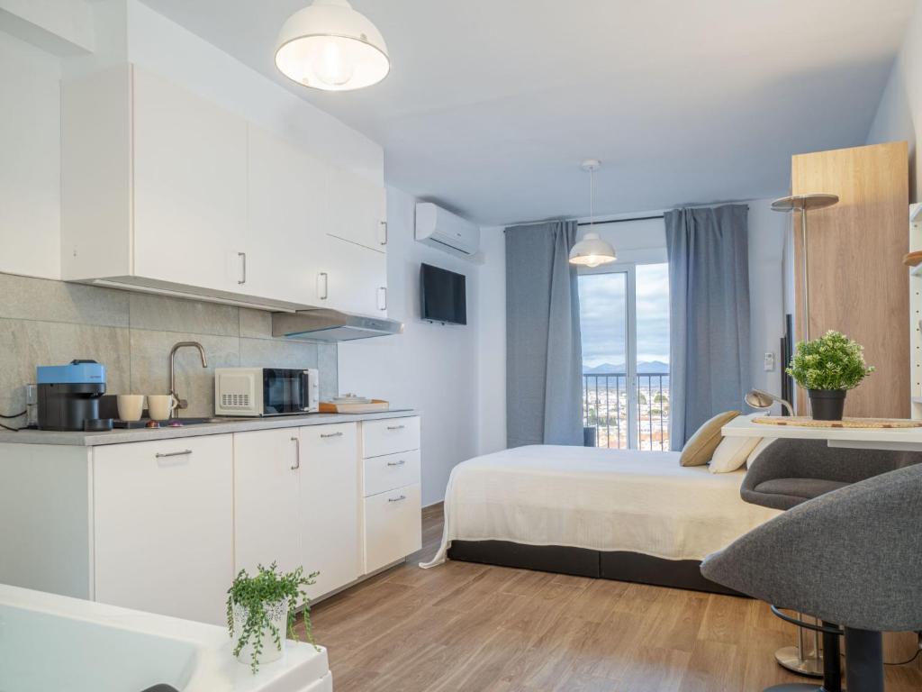 Posteľ alebo postele v izbe v ubytovaní Studio San Luis by Interhome