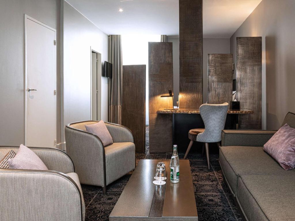 Posezení v ubytování La Cour des Consuls Hotel & Spa Toulouse - MGallery Collection
