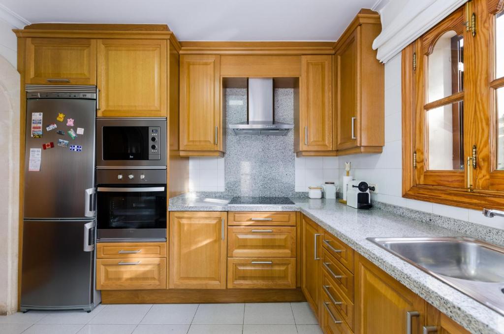 Kuchyň nebo kuchyňský kout v ubytování Villa Teulera