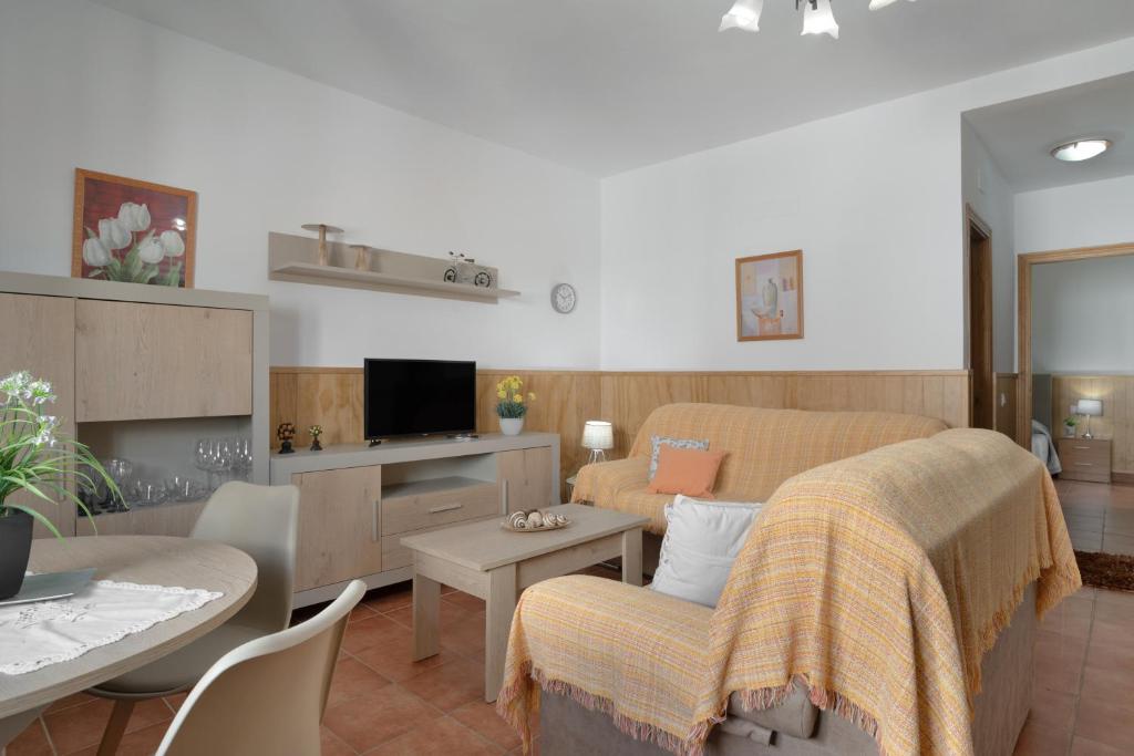 TV a/nebo společenská místnost v ubytování Apartamento Rocio - solo familias