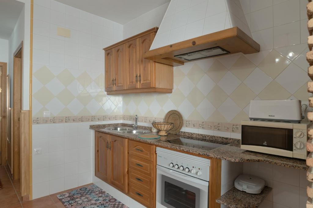 Kuchyň nebo kuchyňský kout v ubytování Apartamento Rocio - solo familias