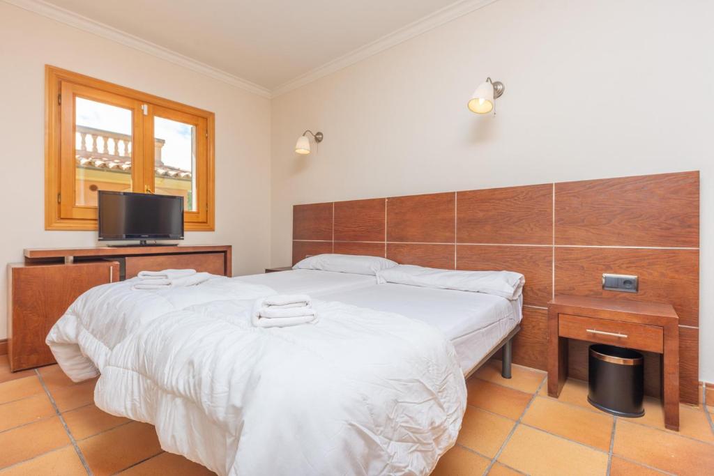 A bed or beds in a room at Paradise 88