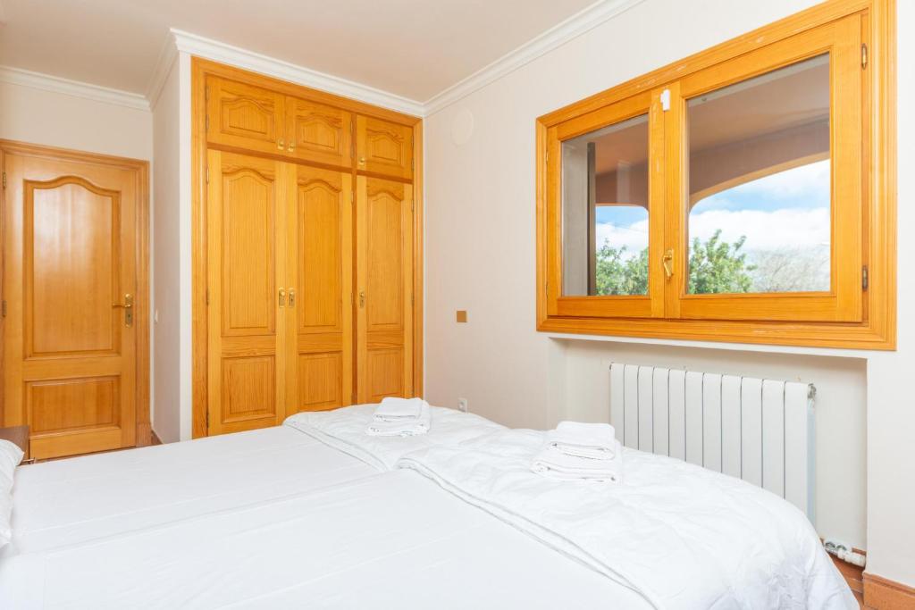 A bed or beds in a room at Paradise 88