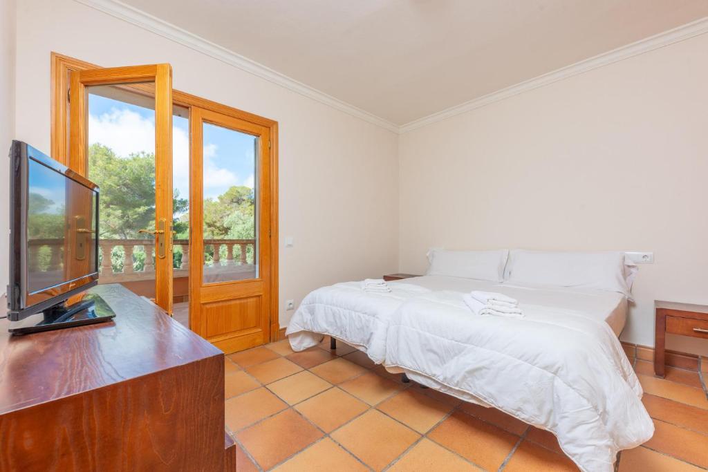 A bed or beds in a room at Paradise 88