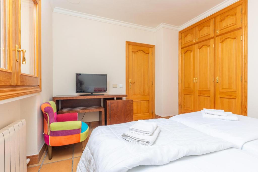 A bed or beds in a room at Paradise 88