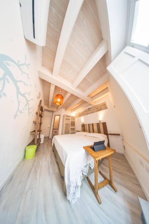 Postel nebo postele na pokoji v ubytování B&B Terra - Stanza Natura