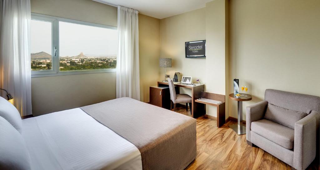 Postel nebo postele na pokoji v ubytování Sercotel JC1 Murcia