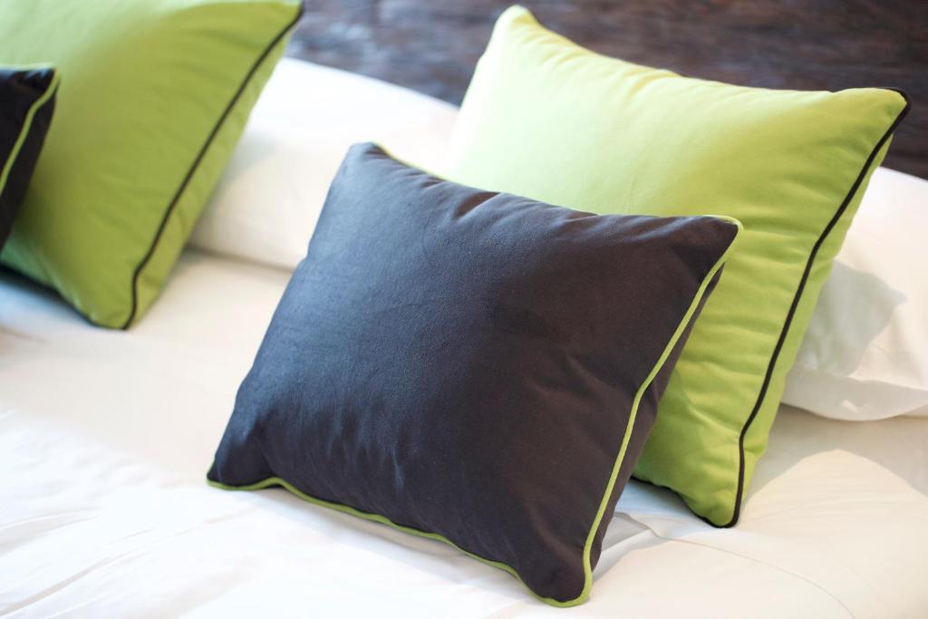 Cama ou camas em um quarto em HT N°9 Colosseo