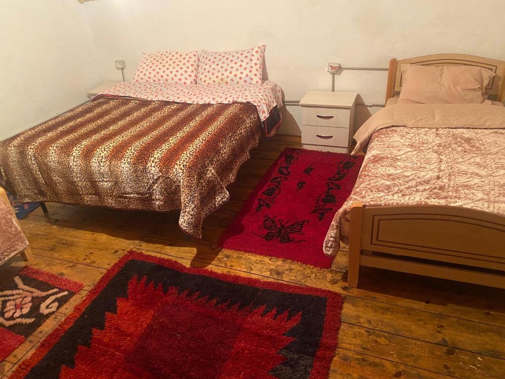 Postel nebo postele na pokoji v ubytování Hotel-Restorant Pepushaj