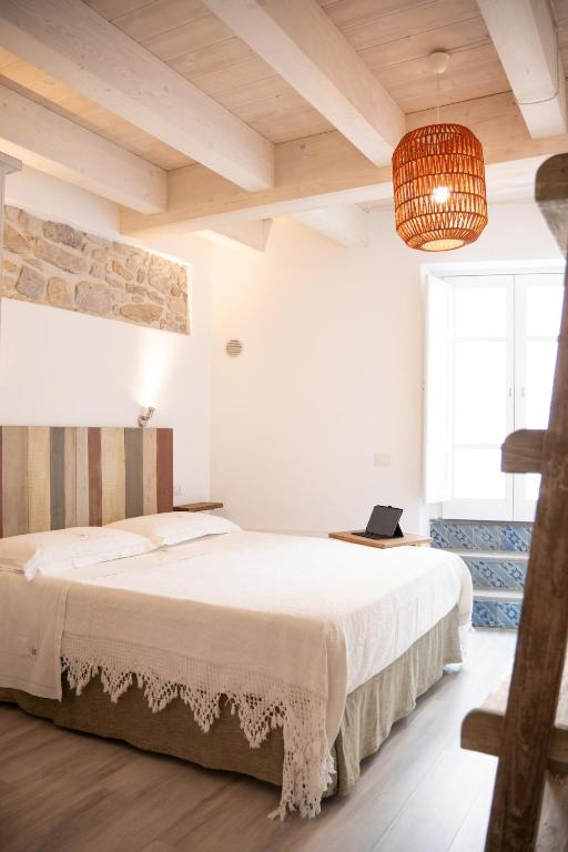 Postel nebo postele na pokoji v ubytování B&B Terra - Stanza Natura