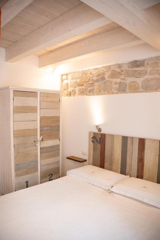 Postel nebo postele na pokoji v ubytování B&B Terra - Stanza Natura