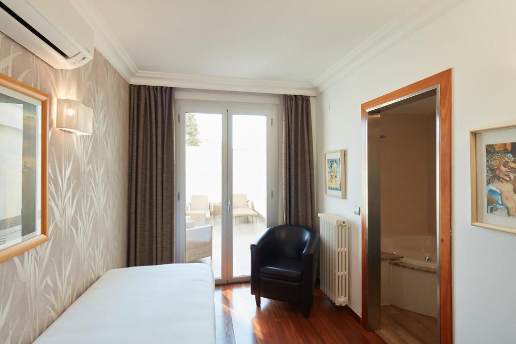 Posteľ alebo postele v izbe v ubytovaní Sercotel Hotel President