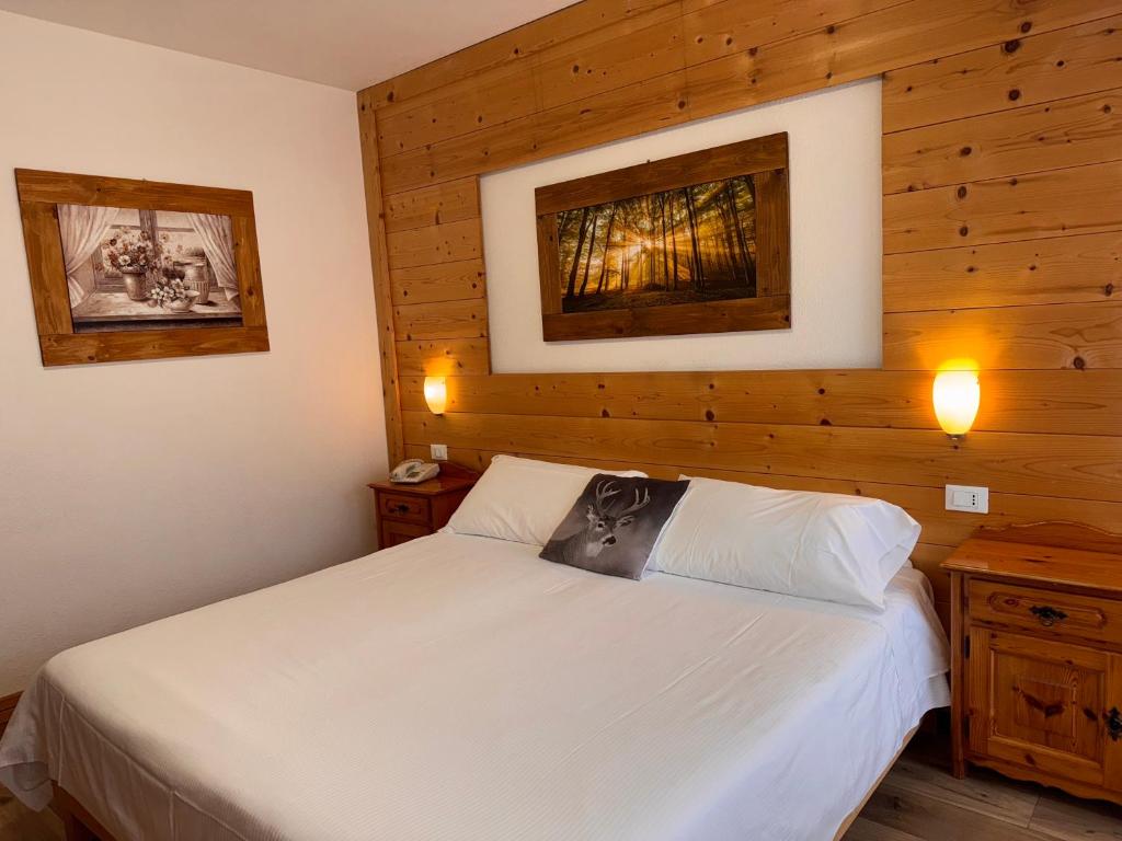 Postel nebo postele na pokoji v ubytování Albergo Scoiattolo