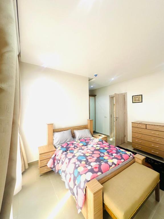 Postel nebo postele na pokoji v ubytování Joy luxury Apartments