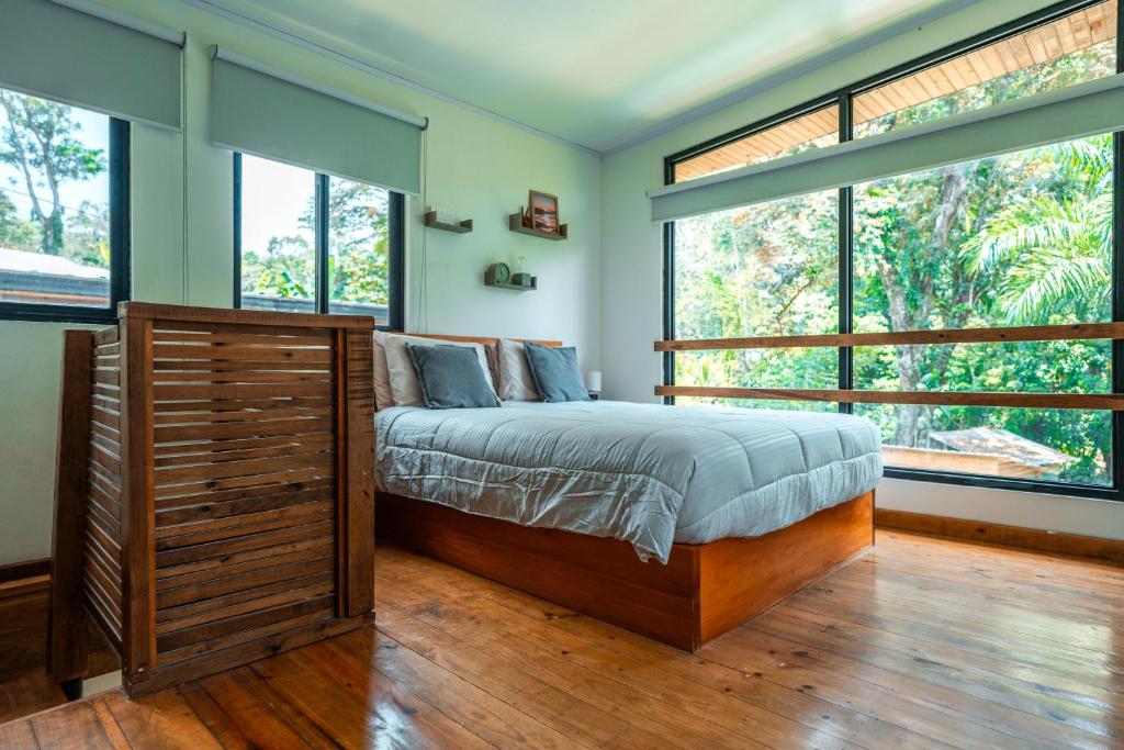Postel nebo postele na pokoji v ubytování MALU Cabins