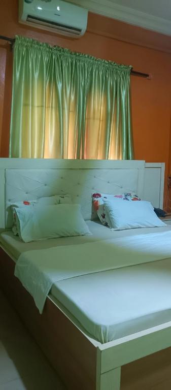 Postel nebo postele na pokoji v ubytování Dorobertty Hotel and Suits