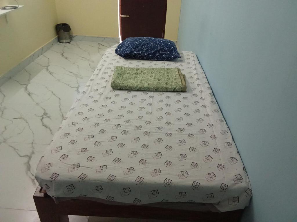 Postel nebo postele na pokoji v ubytování SA Residency