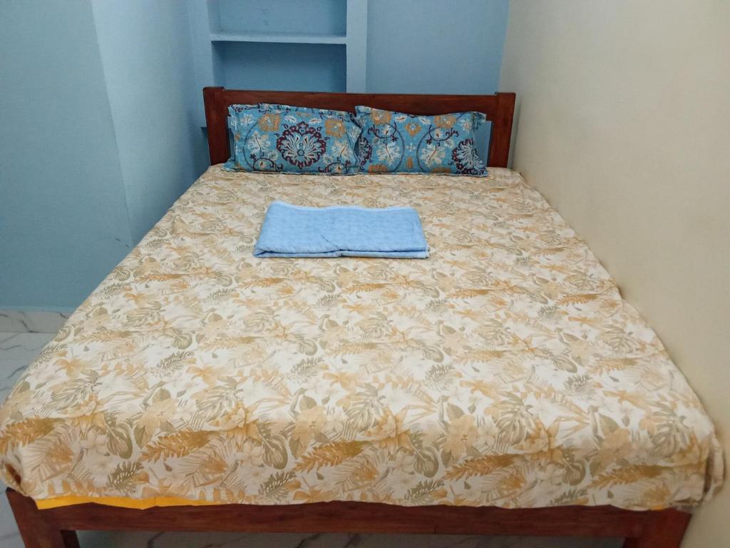 Postel nebo postele na pokoji v ubytování SA Residency