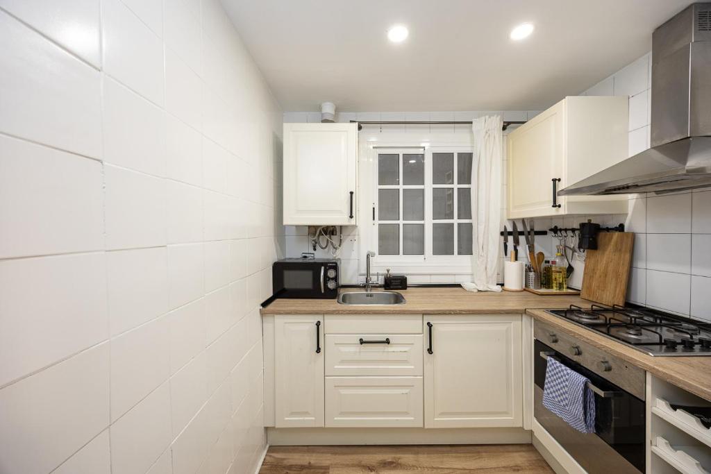 Kuchyň nebo kuchyňský kout v ubytování Vintage 3 Bdr Apartment