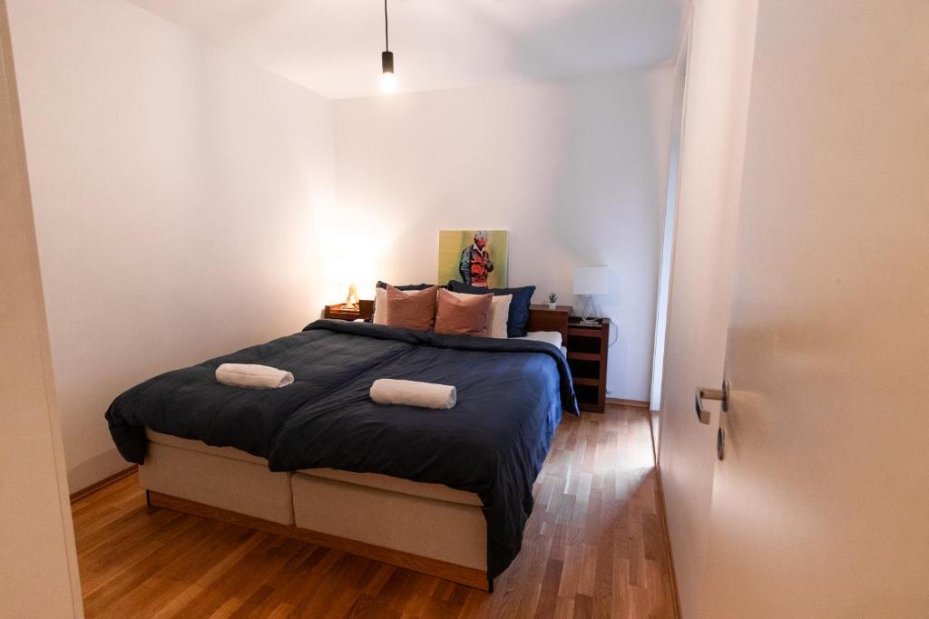 Postel nebo postele na pokoji v ubytování Modern Comfort in the Heart of Bergen