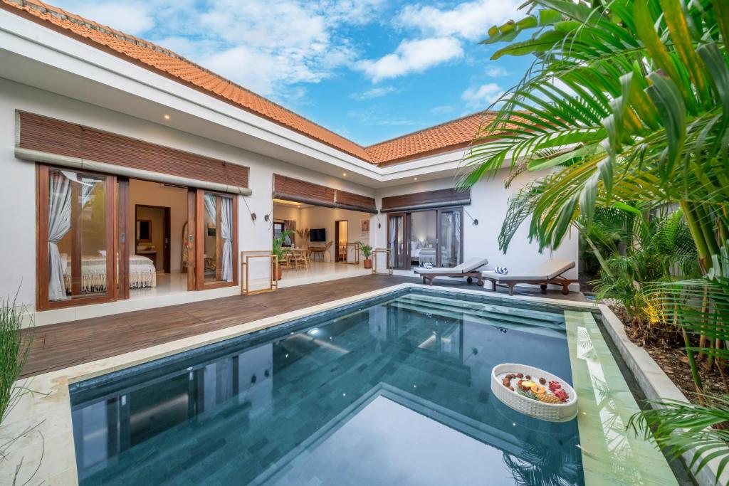 an image of a villa with a swimming pool at Private Pool, Perfect Location -Your Exclusive 3-Bedroom Villa in Canggu -Book Now! in Kerobokan