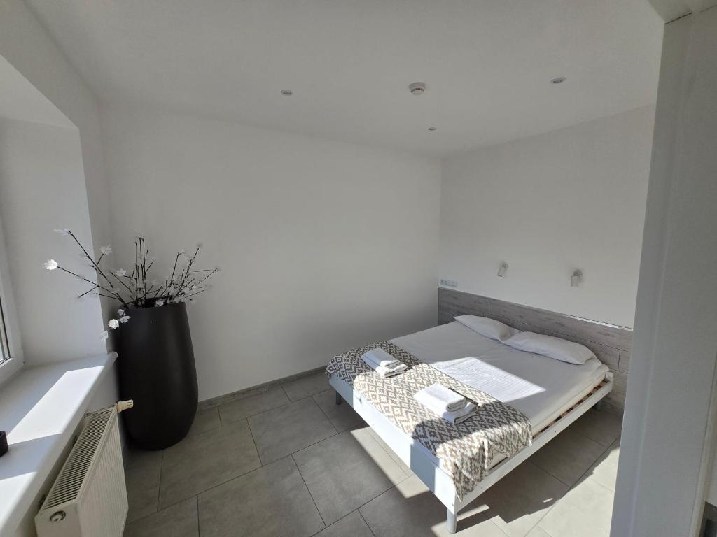 Postel nebo postele na pokoji v ubytování Artel Villa Tarsis
