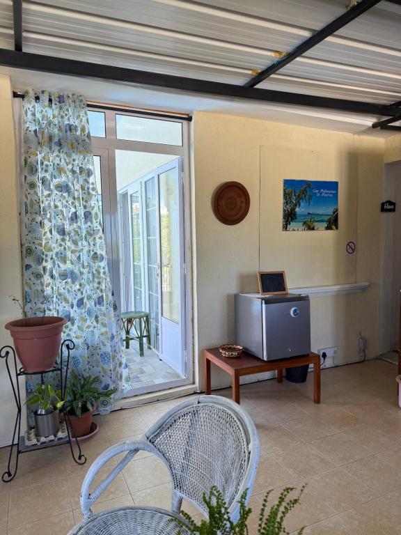 TV a/nebo společenská místnost v ubytování Studio La Casa Azzura