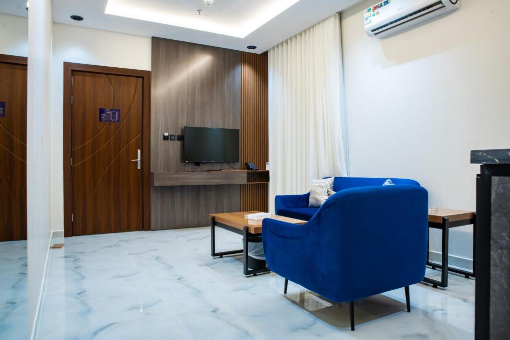 TV a/nebo společenská místnost v ubytování فندق فجر الواحة