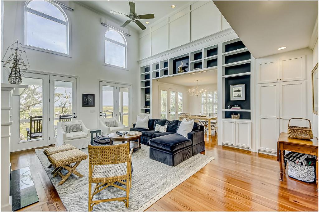 a living room with a couch and a table at Luna Sea in Edisto Beach