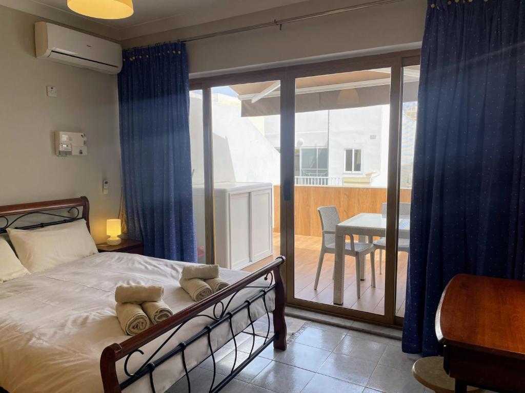 Кровать или кровати в номере City Center Apartments
