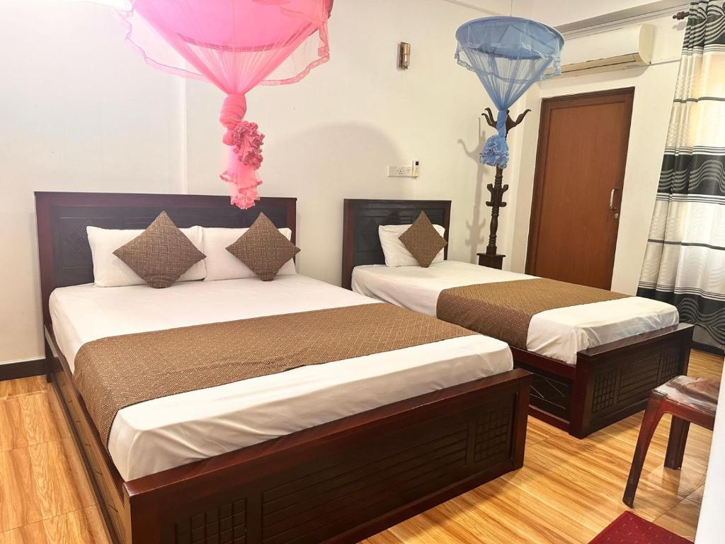 Postel nebo postele na pokoji v ubytování Holiday Villa