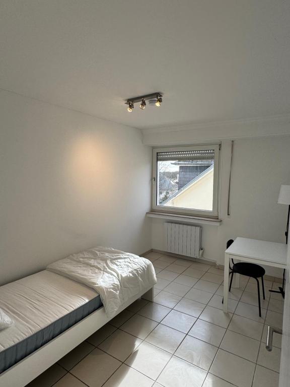 Postel nebo postele na pokoji v ubytování Smart & Cheap Stay for 1 person