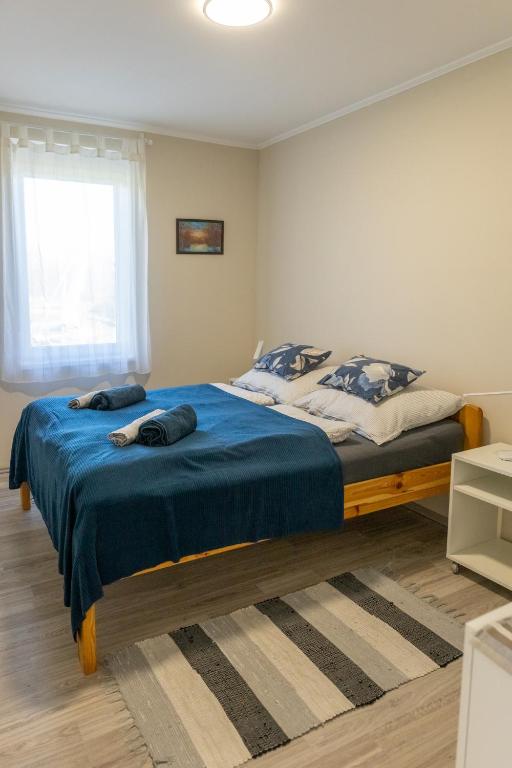 Postel nebo postele na pokoji v ubytování Süni apartman