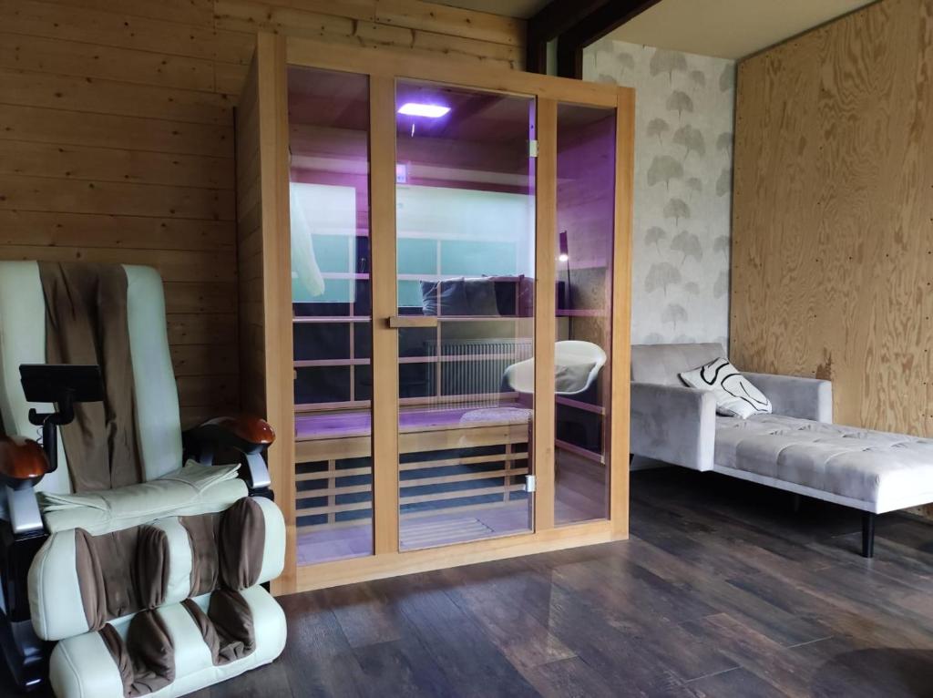 Postel nebo postele na pokoji v ubytování Chalupa Adamův Dvůr